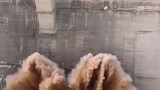 Water Burst Through Old Dam