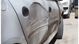 صافکاری فرورفتگی درب خودرو 206 در مجموعه مت کار